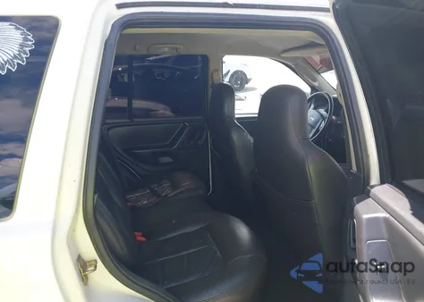 2004 Jeep Grand Cherokee Laredo z USA, uszkodzony, nr VIN 1J4GX48S84C284581